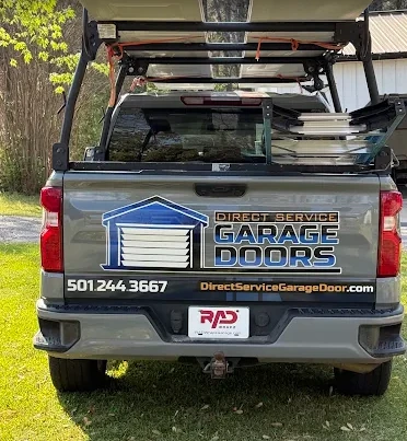 Custom vehicle graphics and tailgate lettering for a garage door company